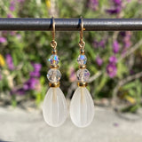 Frosted white glass earrings. Clear Austrian crystal top beads.