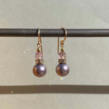 Light amethyst pearl coated crystal earrings. Austrian crystal top beads, gold accents.