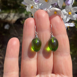 Green glass earrings, handmade in the USA using German glass.