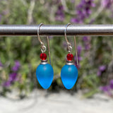 Red and blue glass earrings.
