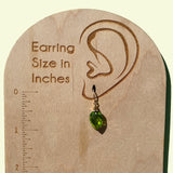 Green glass earrings. Extra fine faceted glass with gold accents.