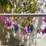 Indigo blue glass earrings. German glass. Gold trim. All handwork done in the USA.