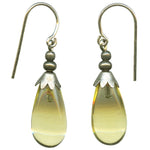 Pale yellow glass drop earrings. German glass, from our collection. Sterling silver ear wires. All handwork done in the USA.