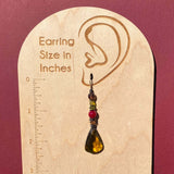 Olive green glass earrings. German and Czech glass with Austrian crystal. Bronze accents with sterling silver ear wires. Handmade in the USA.