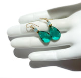 Teal green glass drop earrings with aquamarine Austrian crystal top beads. Gold accents. Handmade in the USA.