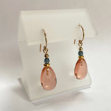 Light peach glass earrings with indigo blue Austrian crystal top beads. Gold trim. All handwork done in the USA.
