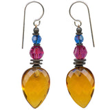 Bright topaz drops, designed by Allen Owen and made for us in Germany. Accents in fuchsia and capri are Austrian crystal. Metal trim is antiqued bronze with sterling silver ear wires. Style 463 earrings measure 1 1/2 inches long.