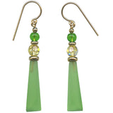 Green drop earrings with gold accents on a white background