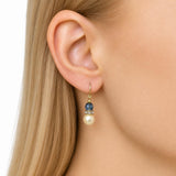 Model wearing crystal pearl earring.