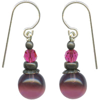 Mauve glass earrings with fuchsia crystal top beads. Bronze accents, silver ear wires.
