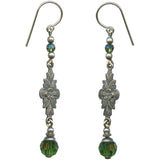 Pair of silver earrings with green beads on a white background