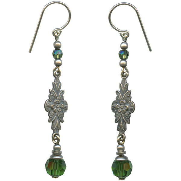 Pair of silver earrings with green beads on a white background
