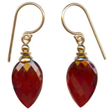 Red glass and gold earrings. 