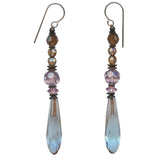 Chandelier 2-toned glass drops in light sapphire and rose, designed by Allen Owen and made for us in Germany. Accents are Austrian crystal in shades of smoke topaz and light amethyst. Trim is antiqued bronze from our own tooling with sterling silver ear wires. Metro 7 earrings measure 2 1/4 inches in length. All handwork done in the USA.