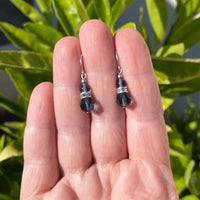 Indigo blue earrings with rhinestone accents and silver earwires.