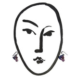 Amethyst crystal and antique Japanese glass earrings with rhinestone accents.