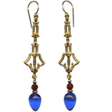 Gold earrings with blue and red beads on a white background