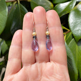 Light amethyst glass earrings, handmade in the USA. Glass pearls, indigo crystal. Sterling silver ear wires.
