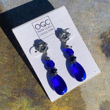 Blue and black post earrings. 