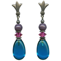 Bright blue post earrings with pink and purple accents, handmade in the USA.