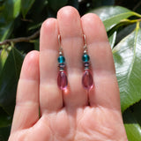 Handmade pink earrings. German glass with teal Czech top beads and jet Austrian crystal. Made in the USA.