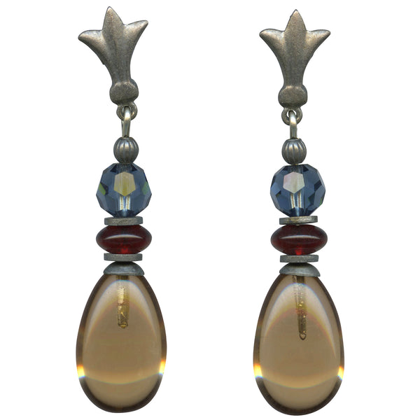 Pair of earrings with teardrop-shaped beads and blue and red accents on a white background