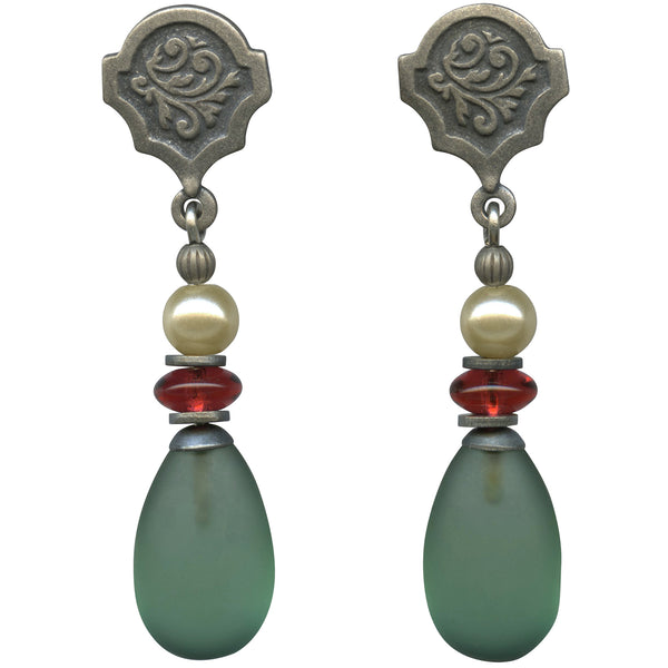 Pair of earrings with green teardrop beads and red and white beads on a white background