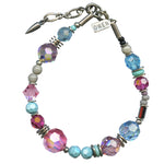 Colorful beaded bracelet with a name tag on a white background