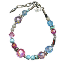 Colorful beaded bracelet with a name tag on a white background
