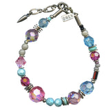 Colorful beaded bracelet with a name tag on a white background
