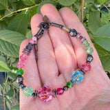 "TIME SCALES" PINK AND AQUA CRYSTAL BEADED BRACELET