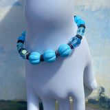 Blue beaded bracelet.