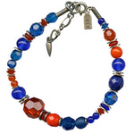 Bracelet with blue and orange beads on a white background