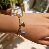 Aqua charm bracelet on model