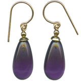 Purple teardrop earrings with gold hooks on a white background
