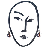 Peach glass earrings with gold trim. 