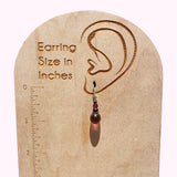Light purple glass earrings. Top beads are Austrian crystal.