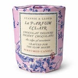 A Stannie & Lloyd La Parfum Éclair perfumed candle wrapped in pink floral paper packaging with a cream-colored central label.