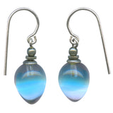 A pair of silver fdrop earrings with teardrop-shaped glass beads showing a blue , white and pink gradient, set against a plain white background.