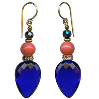 Cobalt German glass earrings. Antique Czech glass focal beads in coral. Top beads are hematite Austrian crystal. Gold trim. Handmade in the USA.