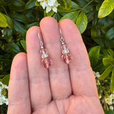 Peach Czech glass earrings. Rhinestone accents with sterling silver ear wire.