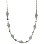 Silver necklace with floral designs and multicolored beads on a white background