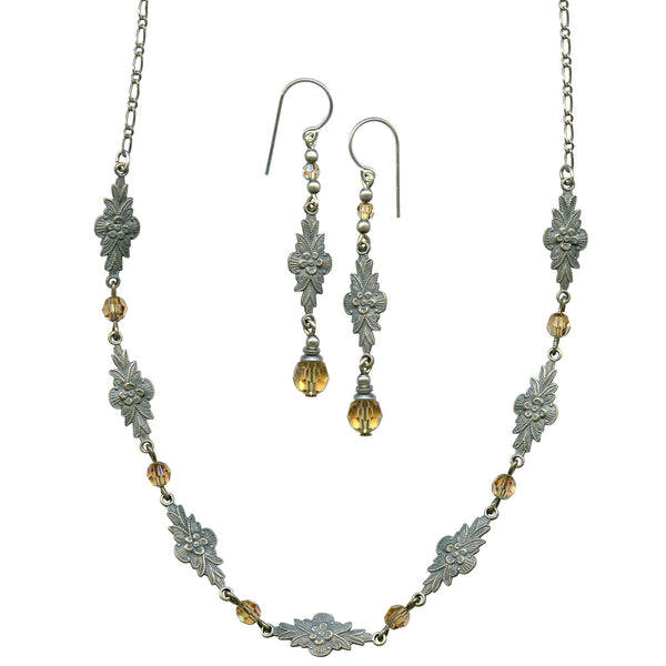 Jewelry set with necklace and earrings on a white background