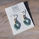Light aqua glass and gold earrings. 