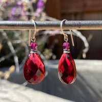 Pink earrings.