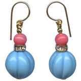 A pair of dangling earrings with gold-filled french wires, pink round beads, clear rhinestone accents, and large light blue ribbed bead drops, shown on a plain white background.