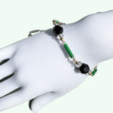 Jet crystal bracelet on a mannequin hand.