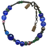 Multicolored beaded bracelet with metal accents on a white background