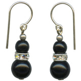 Pair of black beaded earrings with silver accents on a white background