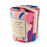 Pistachio Milk candle showing folded paper top and Stannie & Lloyd ribbon, angled view